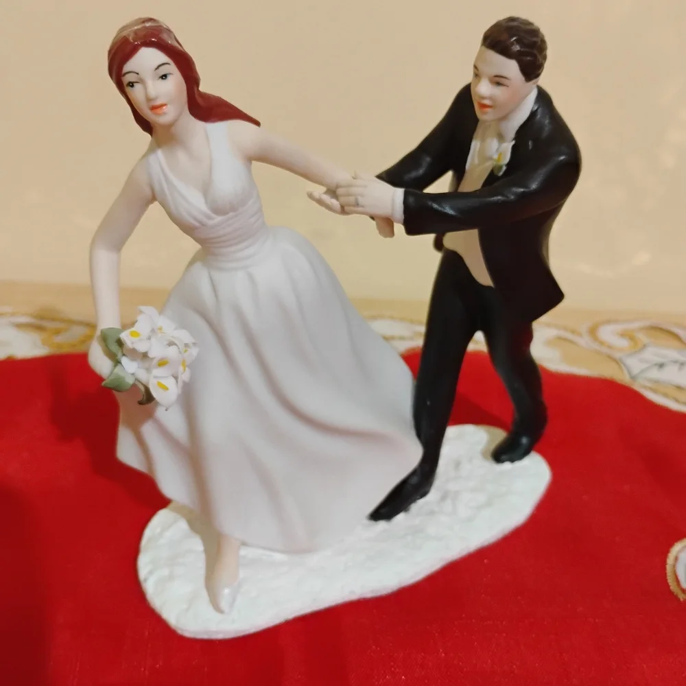 Elegant Wedding Cake Topper with Bride and Groom